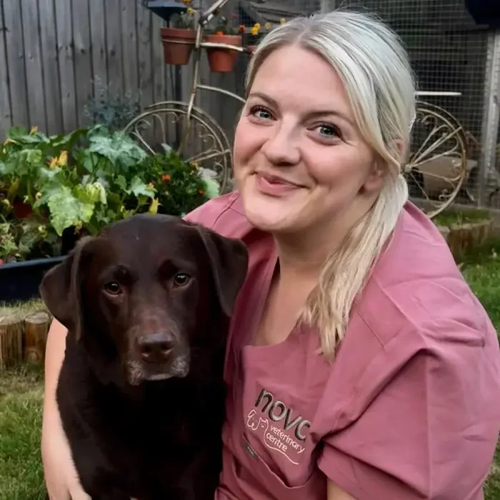 close up of lucy from nova vets with dog